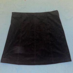 Plain black skirt. Very soft and almost velvety material.